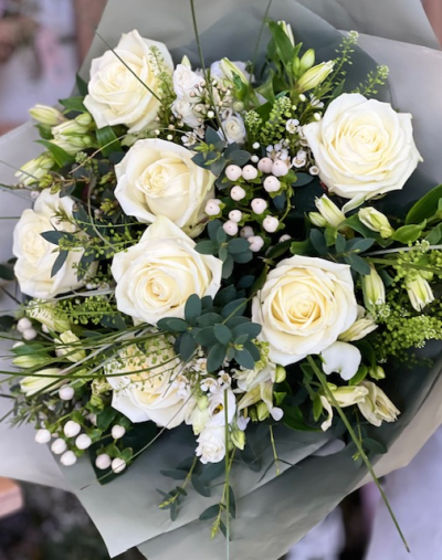 Garden Haze - A soft and elegant blend of whites, creams and muted greens, Garden Haze evokes the stillness of early morning mist across the horizon.  This bouquet is subtle yet layered, with natural movement and an effortless, ethereal charm.

Please take a look at our gallery for other beautiful neutral designs and colour palettes.