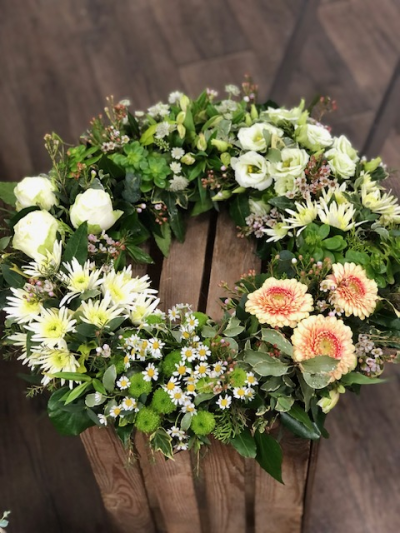 Wreath Neutral - Our neutral funeral wreath is a serene and graceful tribute, designed with soft understated tones, a gently mix of creamy whites, pale blush or peach accents and fresh greenery