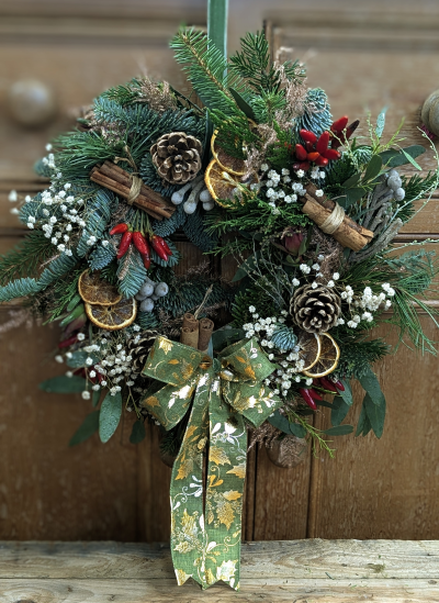 The Winter Spice Wreath - Welcome the festive season with our richly textured and beautifully fragrant Winter Spice Wreath. Hand-crafted using the finest seasonal foliage, this wreath brings the natural beauty and warming scents of a country Christmas right to your door.